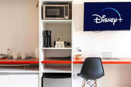 Family Magical Studio for 4  Shuttle to Disney