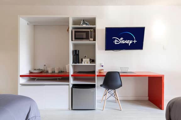 Family Magical Studio for 4  Shuttle to Disney